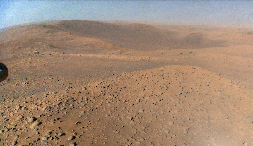 NASA's experimental helicopter Ingenuity snapped this Martian vista from 40 feet up in the air.