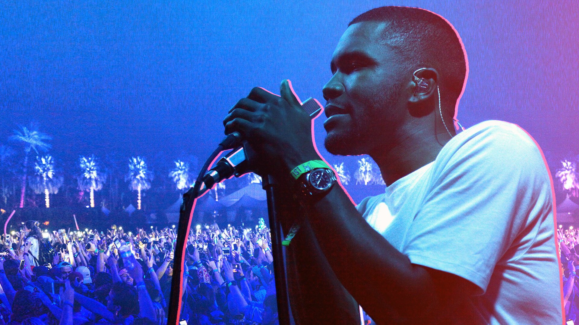 A photo of Frank Ocean holding a mic and singing photoshopped over an image of the Coachella crowd. The image has a blue and pink filter.