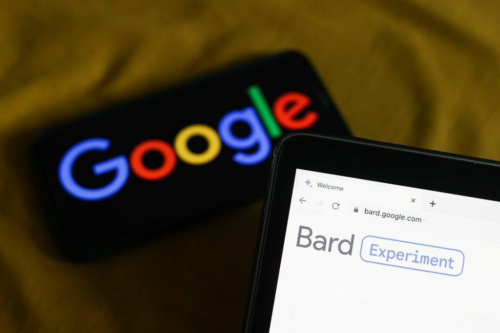 Bard AI chatbot on a smartphone in front the Google logo