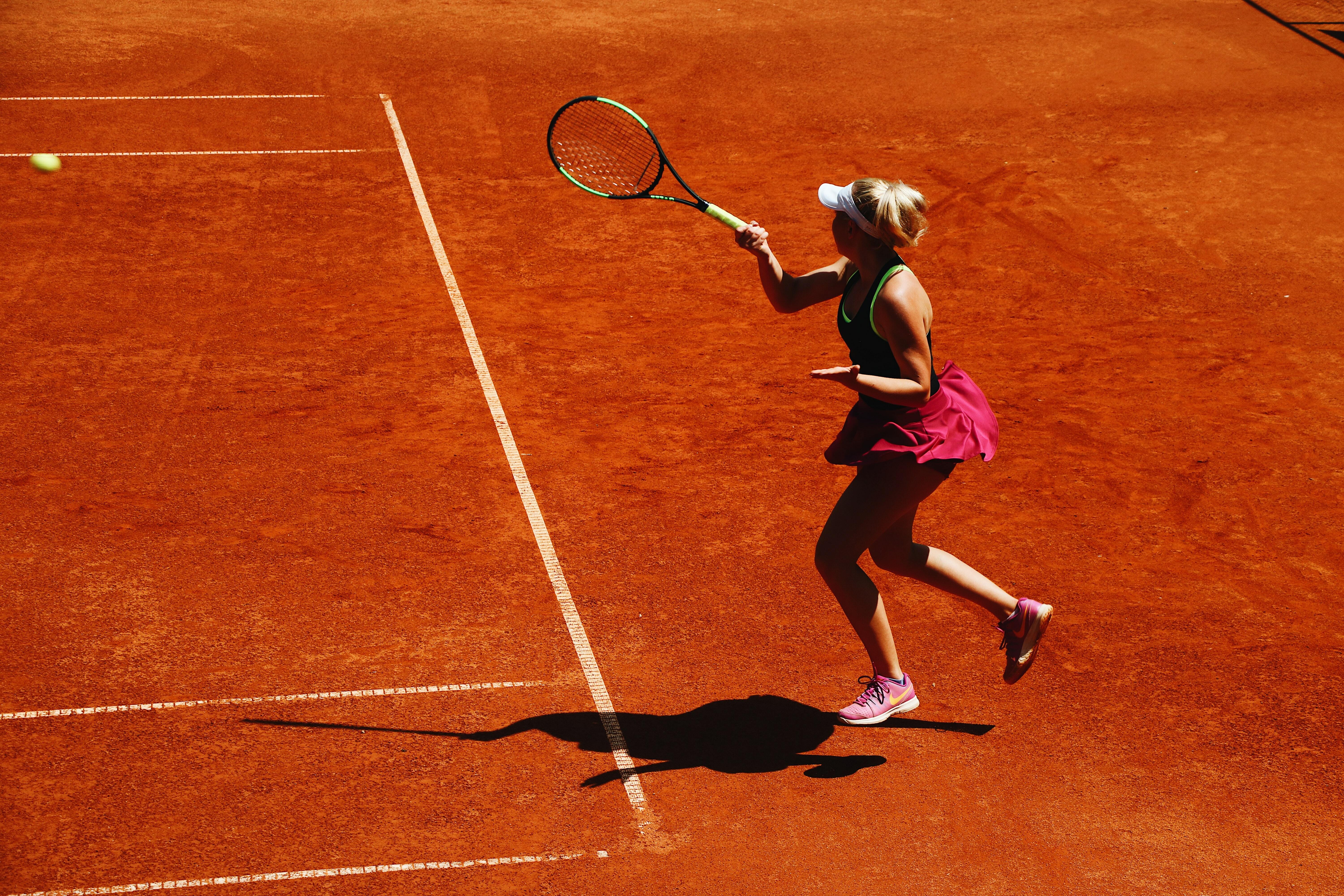 Tennis player on clay court