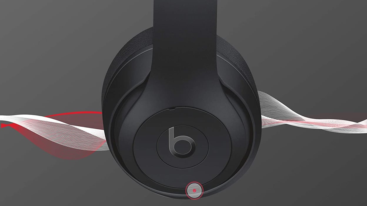 Black Beats Studio3 Wireless Noise Cancelling Headphones on dark background