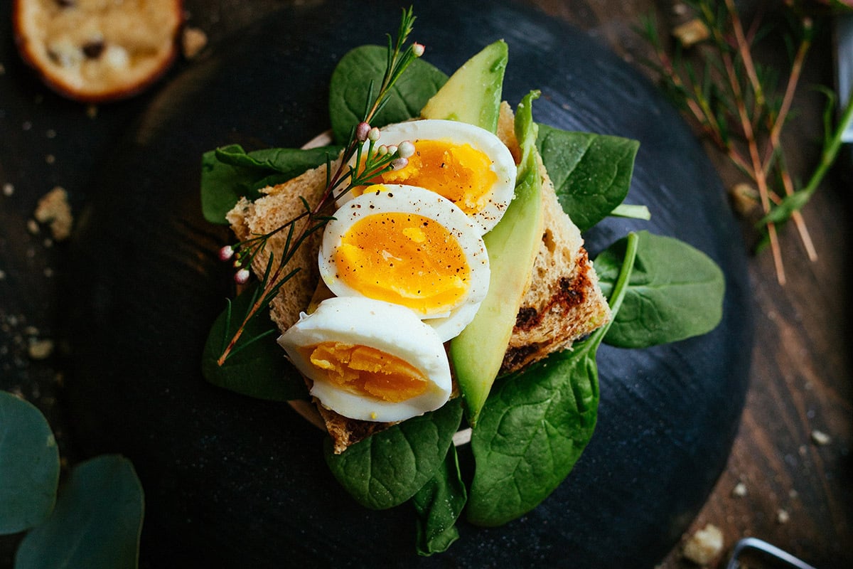 Boiled eggs on top of a salad