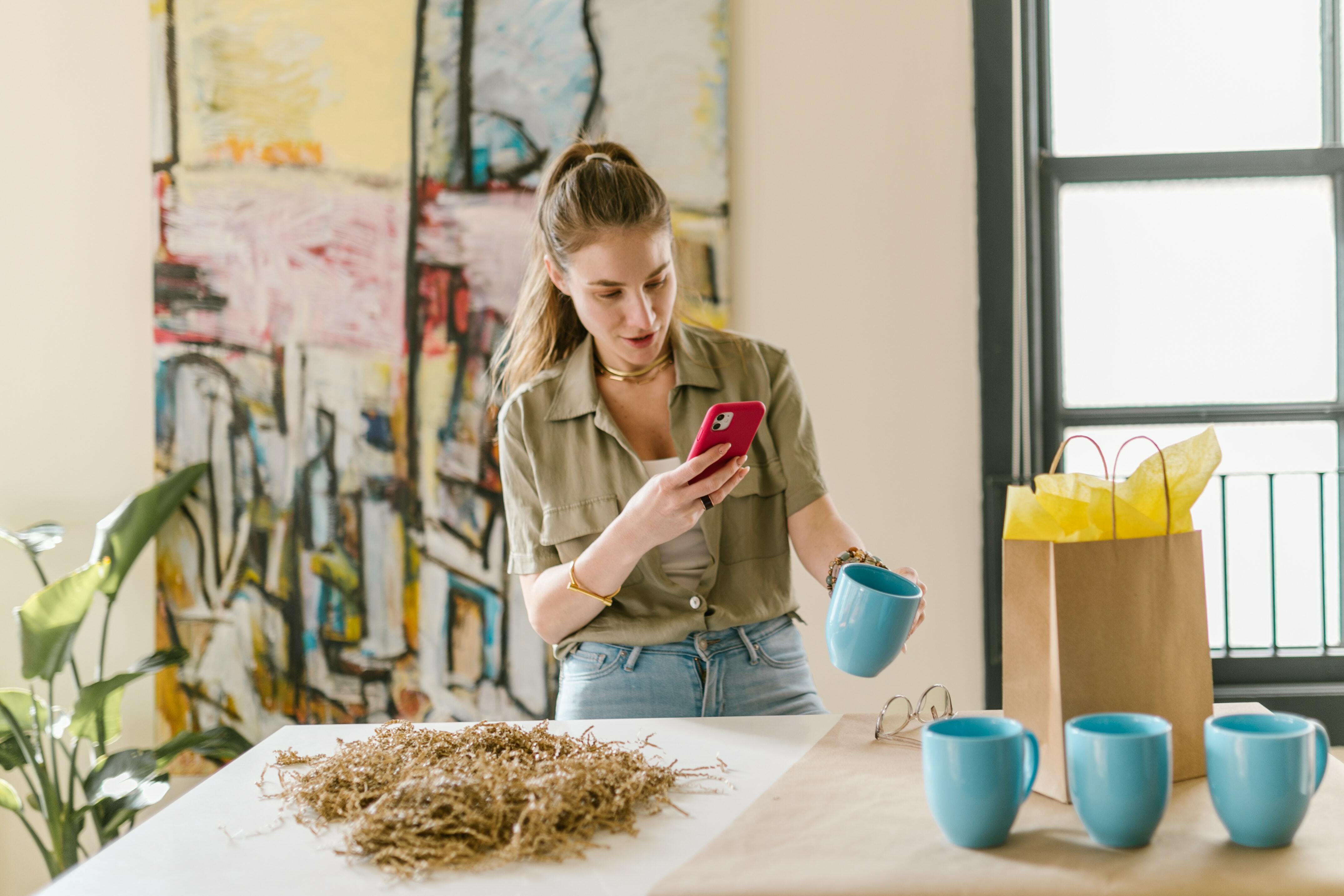 Girl selling mugs