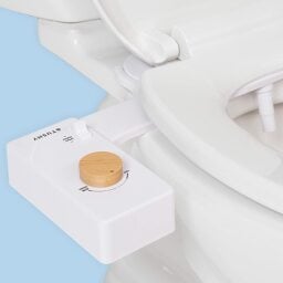 tushy attachment on toilet with bamboo knob