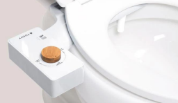 Tushy bidet attached to toilet seat