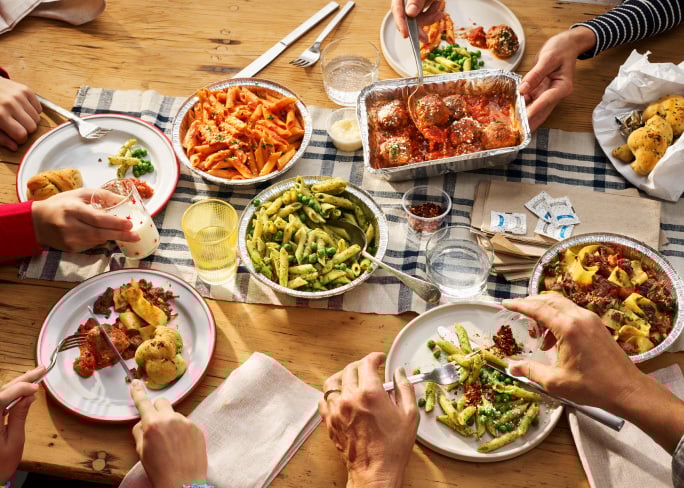 Italian food served family-style on a table