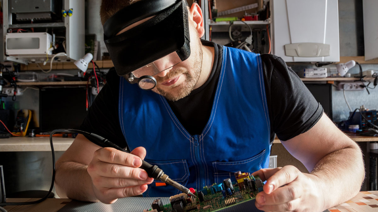 Enginner looking at circuits