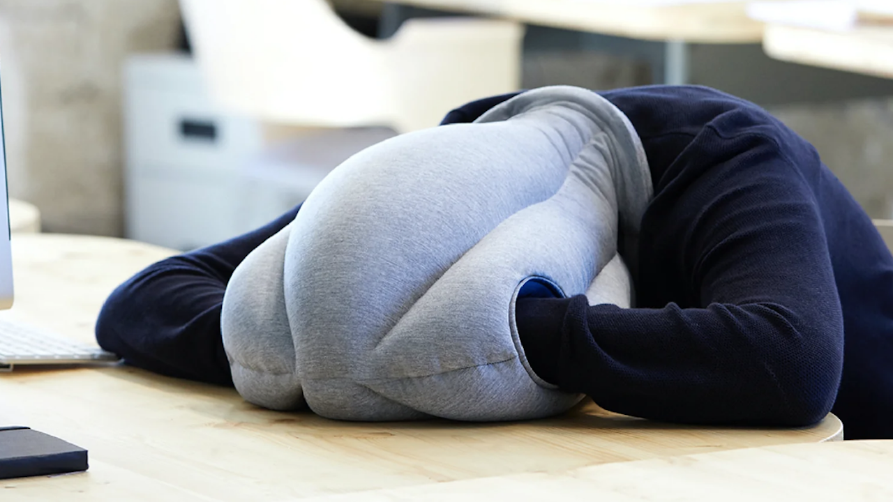 Person wearing Ostrich Pillow