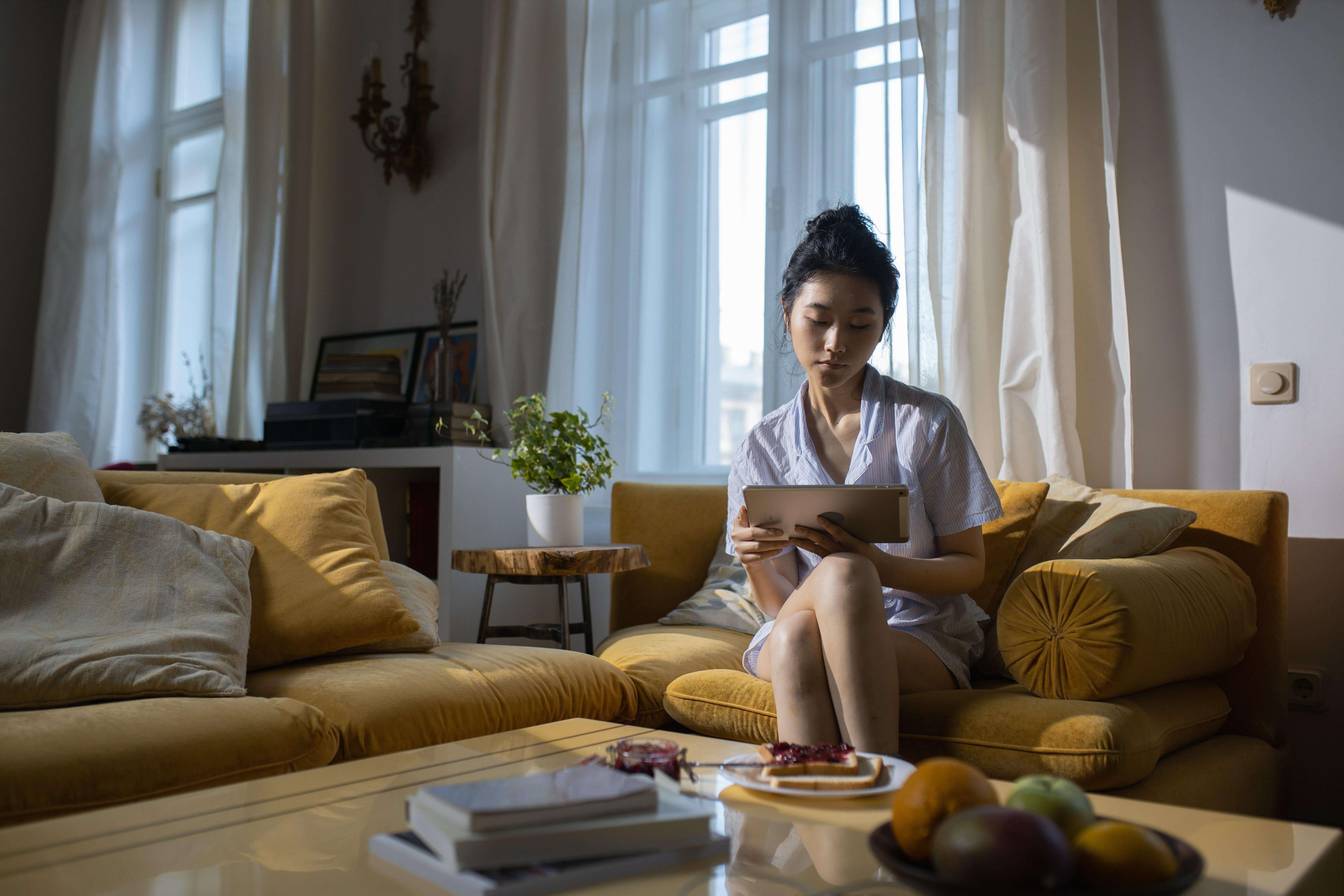 Woman looking at laptop
