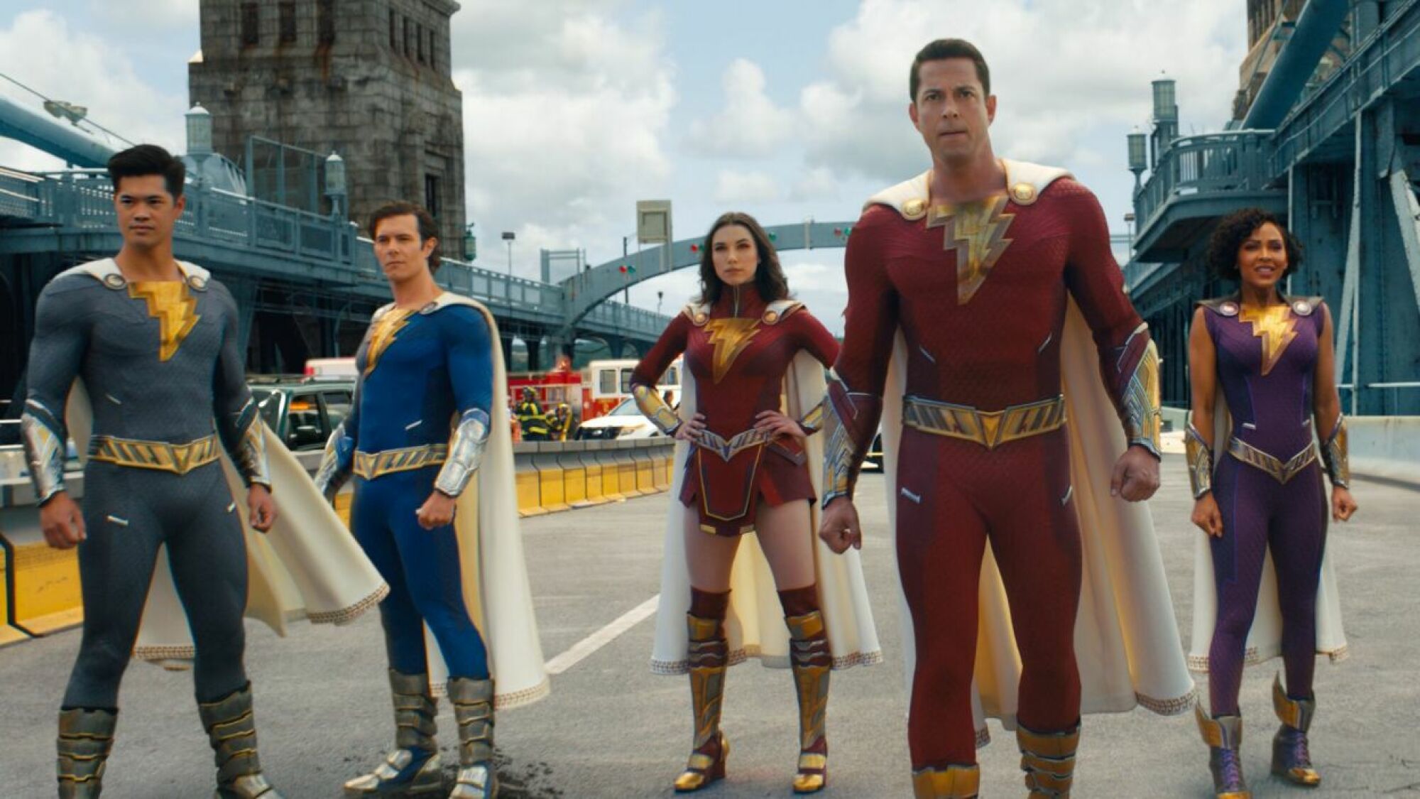 A group of superheroes stand in the street in the film "Shazam! Fury of the Gods"