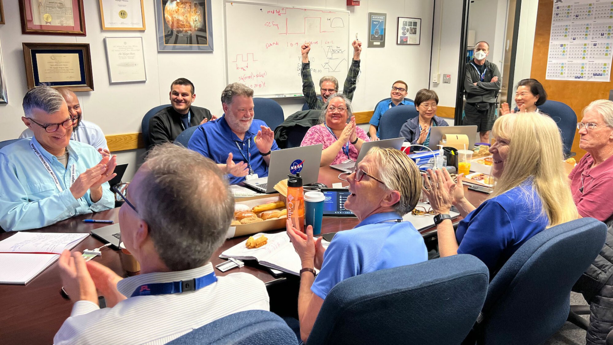 The Voyager team celebrates after restoring some communication to Voyager 1 on April 20, 2024.