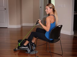 Woman using strider while seated.