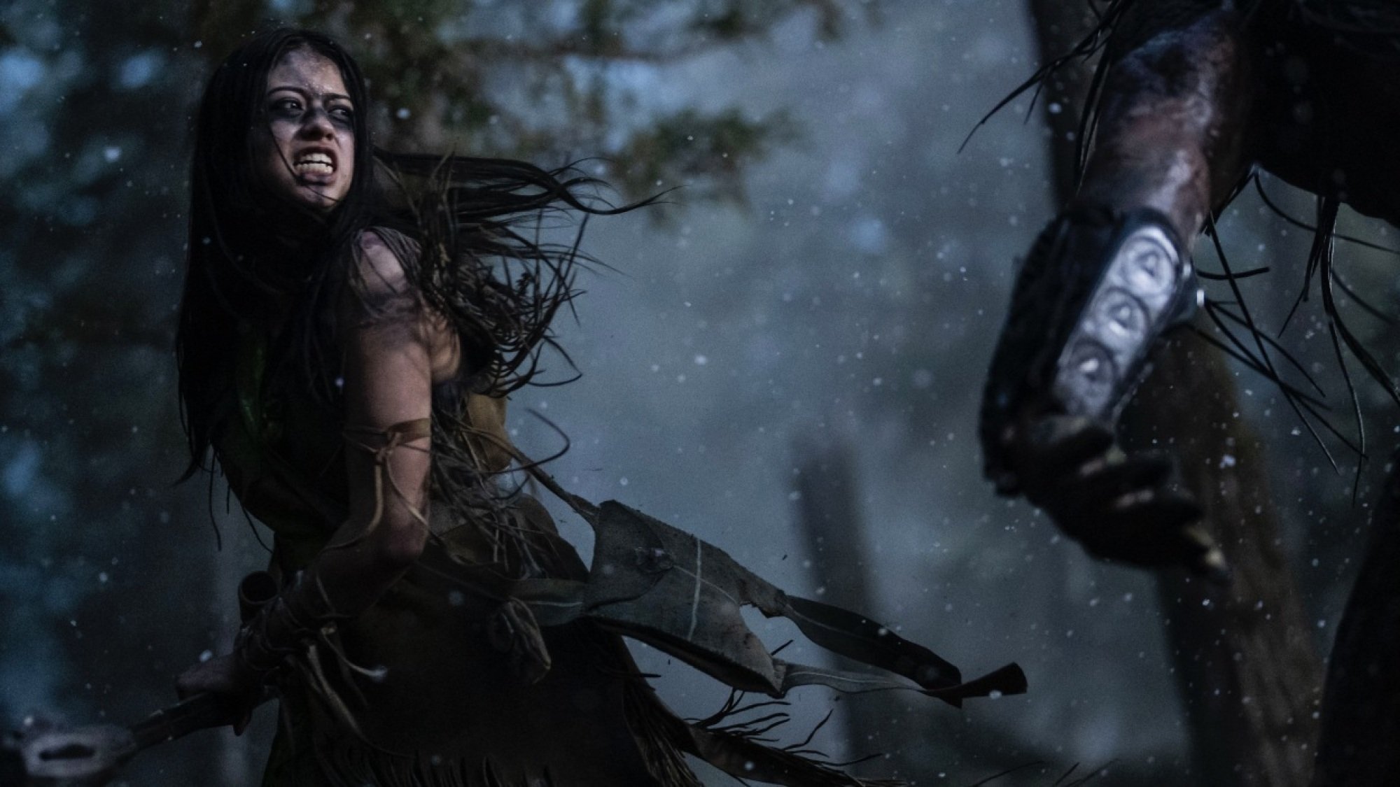 A young woman battles an alien in "Prey."