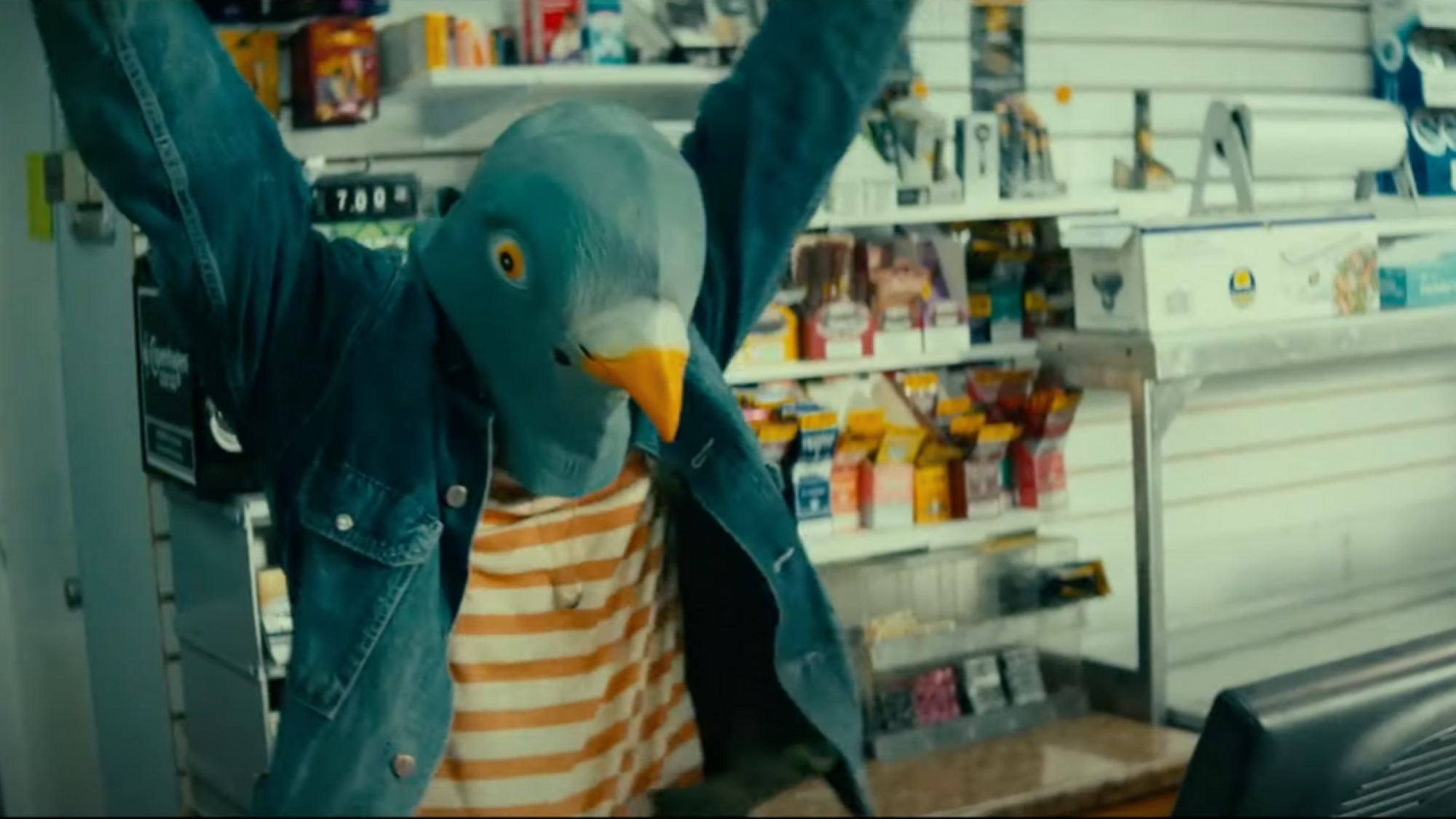 A man wears a pigeon mask in "Villains"