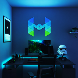 a star wars-themed nanoleaf lighting setup above a gaming pc in a dark room