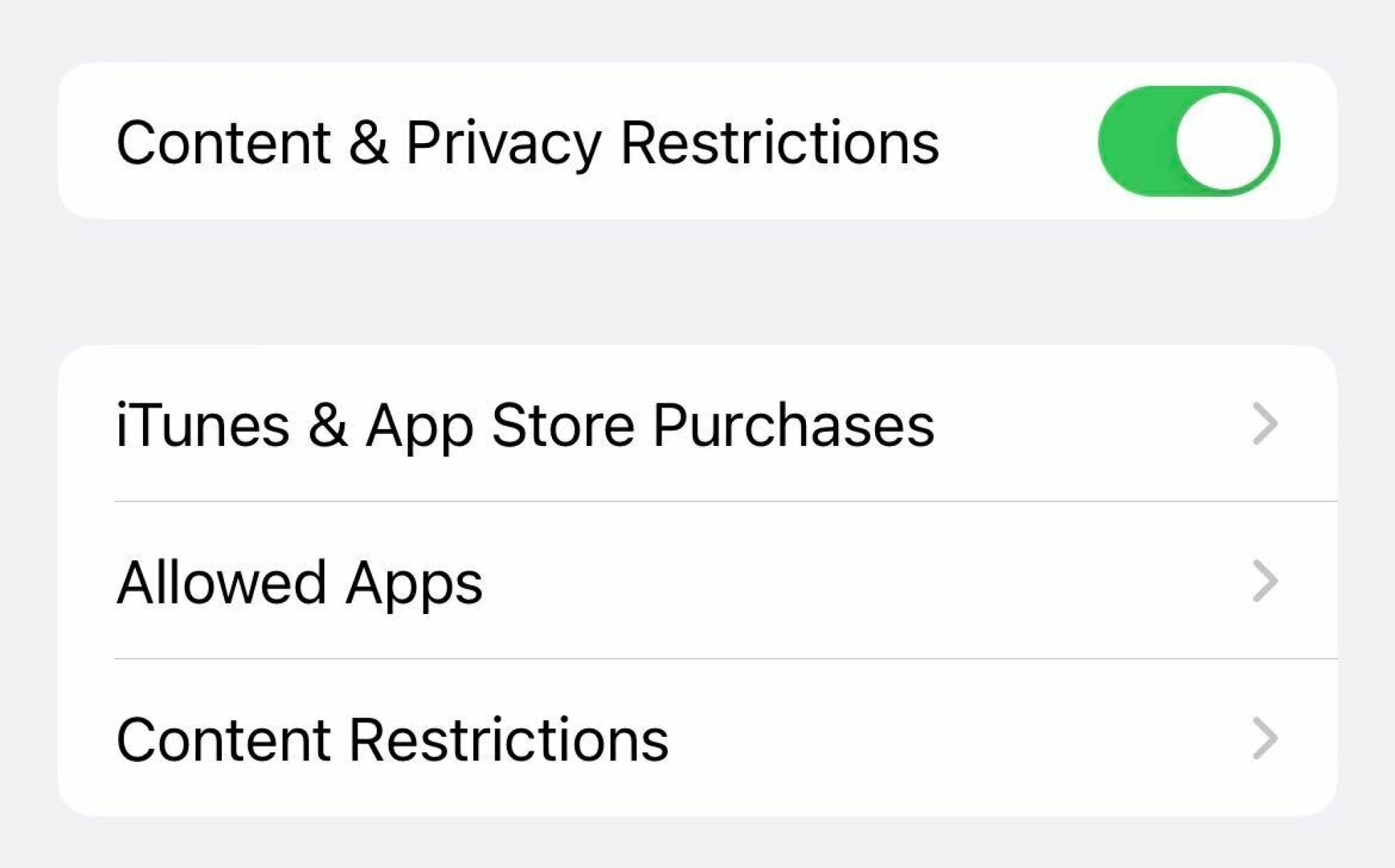A screenshot of the "Content & Privacy Restrictions" toggle on.