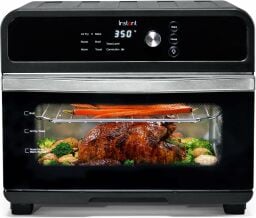 Instant Omni air fryer oven with rotisserie chicken inside