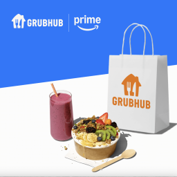 Grubhub bag, acaí bowl, and smoothie with Grubhub and Prime logos in background