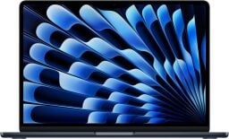 A Macbook Air displays a feathery abstract pattern on its screen.