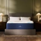 the dreamcloud premier hybrid mattress in a bedroom