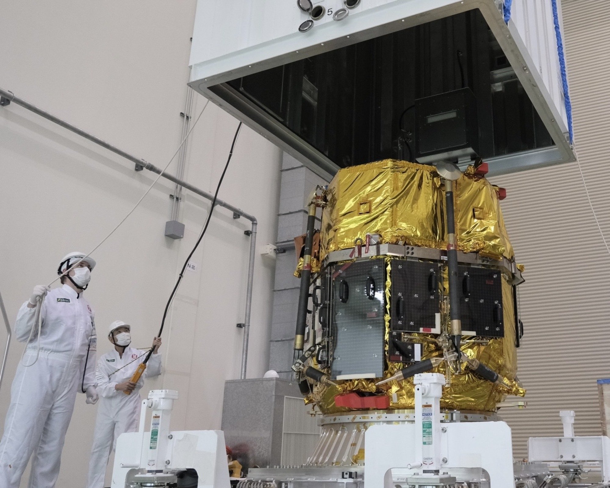 Loading the Resilience lander into a shipping container