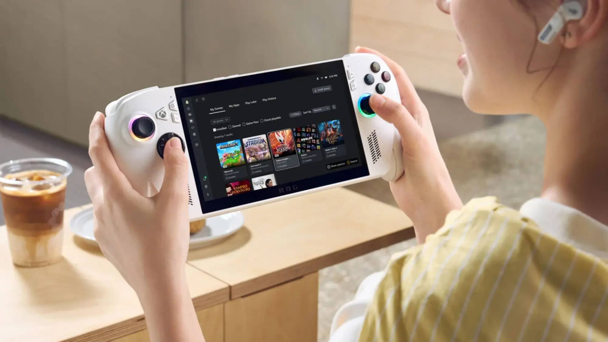 woman holding ROG xbox ally handheld gaming pc
