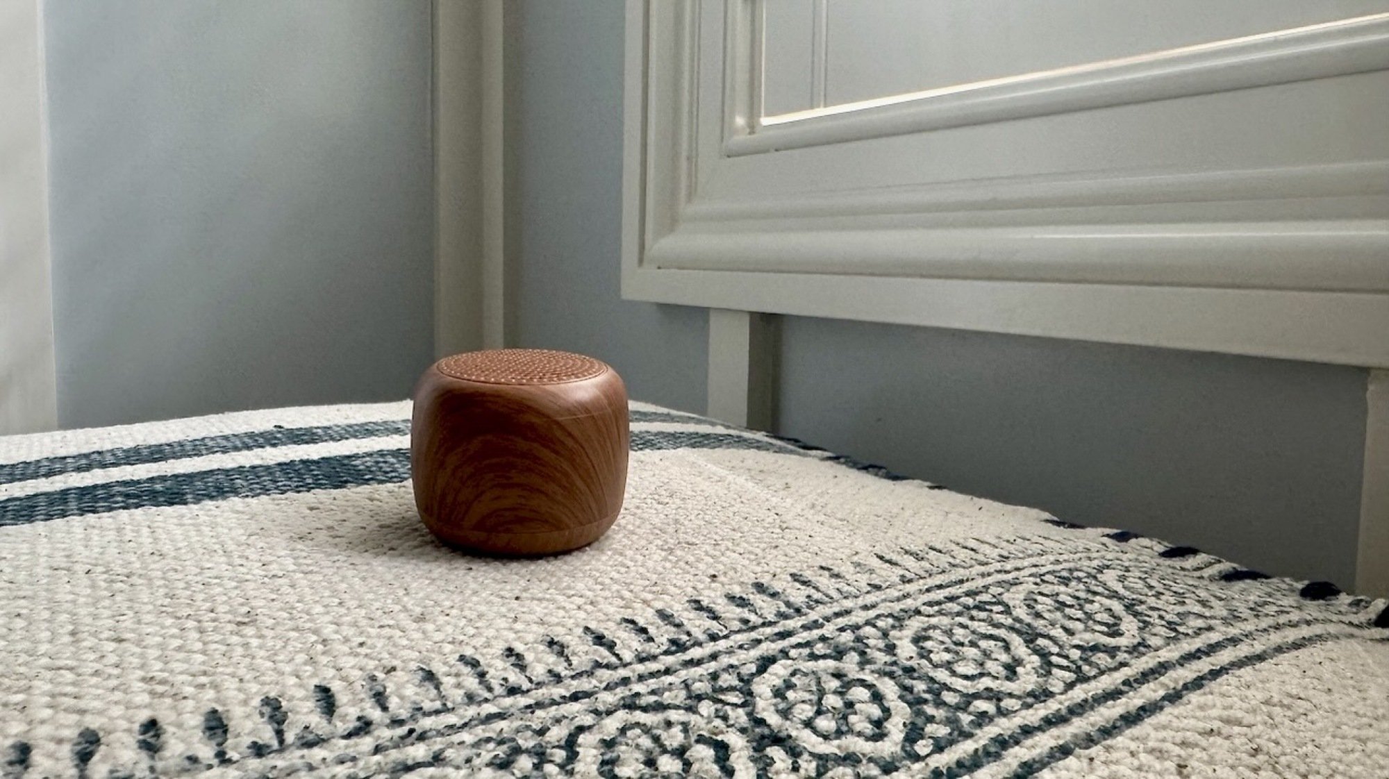Babelio portable sound machine sitting atop a cushion